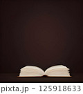 An opened book isolated on a gray background with copy space for your work. 125918633