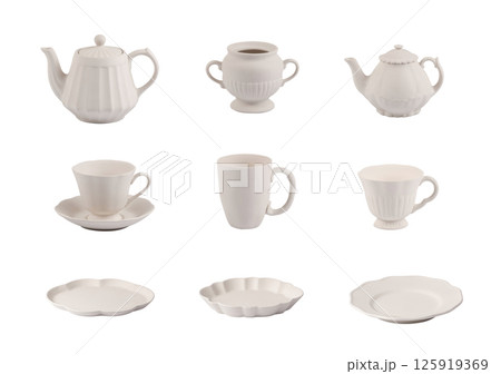 white ceramic teapot, White ceramic coffee mug and White ceramic plate, ceramic tableware isolated on a white background. 125919369
