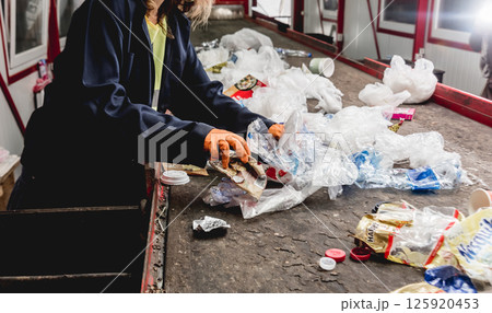 At modern recycling plant. Separate garbage collection.  125920453