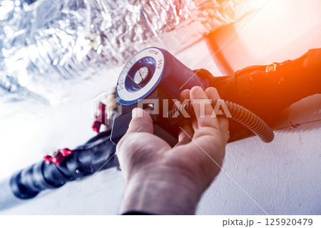 Ventilation cleaning. Specialist at work. Repair ventilation system  125920479