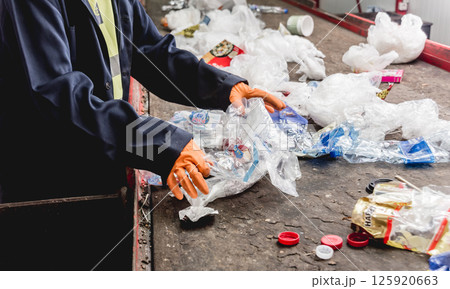 At modern recycling plant. Separate garbage collection. 125920663