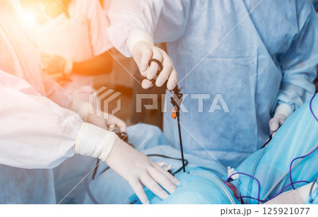 Process of gynecological surgery operation using laparoscopic equipment.  125921077