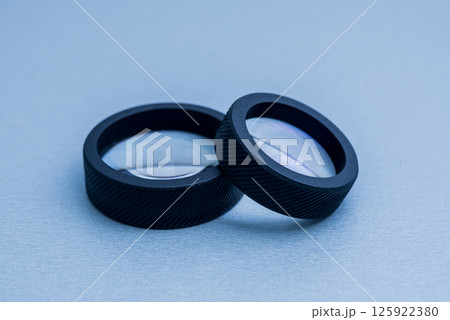 Indirect ophthalmoscopy lens on the grey table. Indirect ophthalmoscopy lens on the grey table. 125922380