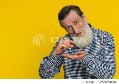 Senior man show a little bit gesture begging help need some more please give me measuring small size 125923036