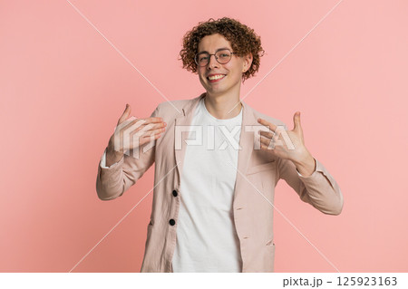 Caucasian man feeling very proud pointing himself overjoyed by success making choice self-confident 125923163