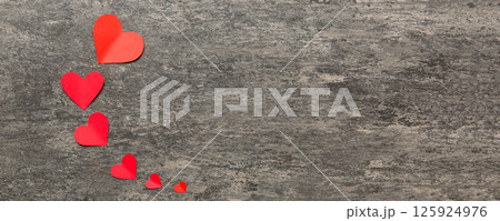 Valentine day background with red hearts, top view with copy space Valentine day background with red hearts, top view with copy space 125924976