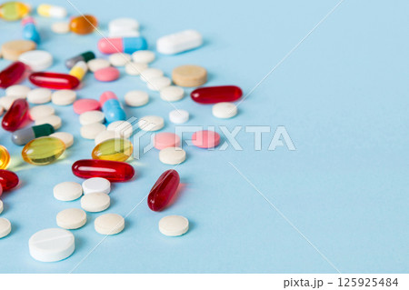 Many different colorful medication and pills perspective view. Set of many pills on colored background Many different colorful medication and pills perspective view. Set of many pills on colored background 125925484