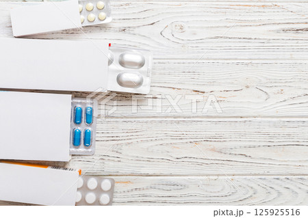 Blank White Product Package Box Mock-up. Open blank medicine drug box with blister top view Blank White Product Package Box Mock-up. Open blank medicine drug box with blister top view 125925516