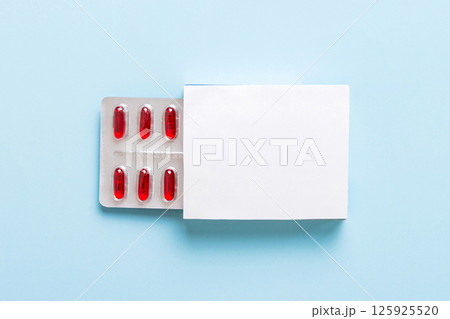 Blank White Product Package Box Mock-up. Open blank medicine drug box with Vatamin a blister top view Blank White Product Package Box Mock-up. Open blank medicine drug box with Vatamin a blister top view 125925520