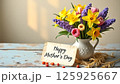 Mother's Day Bouquet with Greeting Card on Rustic Table 125925667