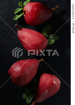 Tasty and delicious food concept - pear in wine Tasty and delicious food concept - pear in wine 125925887