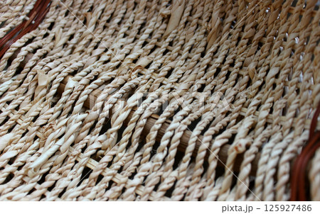 Technique of hand weaving products from twigs in the form of a braid 125927486