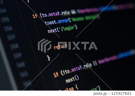 close-up of computer screen with colorful programming code lines, focus on return keyword, software development and coding 125927681