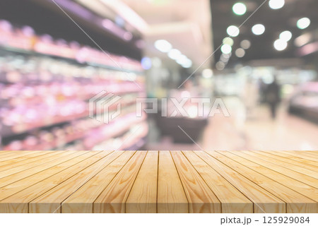 Empty wood table top with supermarket blurred background for product display 125929084
