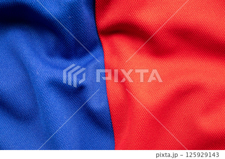 Blue and red sports clothing fabric football shirt jersey texture Blue and red sports clothing fabric football shirt jersey texture 125929143