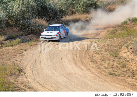 Rally Car Enters a Turn 125929887