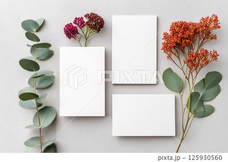 Wedding invitation mockup featuring blank card design with floral elements for mockup 125930560