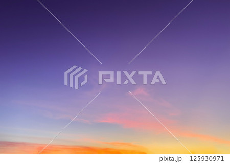 Purple sunrise sky background. Sky with orange golden sunrise clouds. Nature sky background for design. Purple sunrise sky background. Sky with orange golden sunrise clouds. Nature sky background for design. 125930971