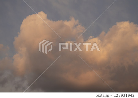 Beautiful dramatic clouds in the sky. The vast and clouds sky. 125931942