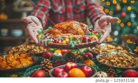 table is elegantly set for celebrating Christmas or New Year. 125933116