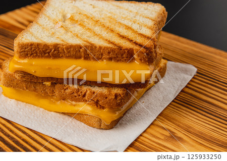 Foot care procedure with medical gloves on patients toes 125933250