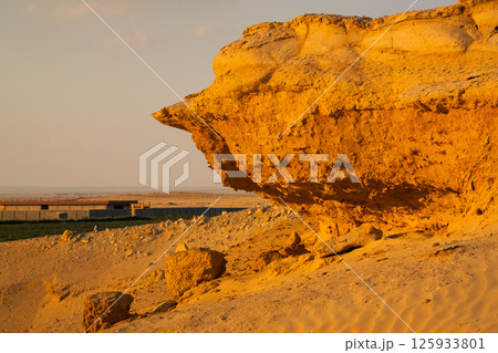 Yellow sand dunes in the desert Sahara in Egypt	 125933801
