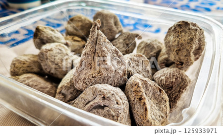 Small dried figs in the shop. Dried fruits Small dried figs in the shop. Dried fruits 125933971