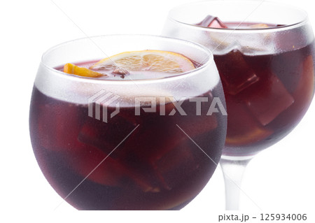 Refreshing Summer Citrus Fruit Sangria in crystal glass isolated on white background 125934006
