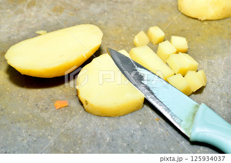 Boiled potatoes cut into pieces. Boiled potatoes cut into pieces. 125934037