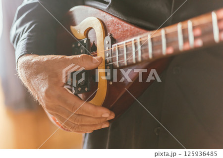 Close up hand playing Thai Mandolin Close up hand playing Thai Mandolin 125936485