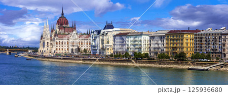Budapest capital city of Hungary. Iconic view of Parlament (hungarian parliament) over Danube river. Budapest capital city of Hungary. Iconic view of Parlament (hungarian parliament) over Danube river. 125936680