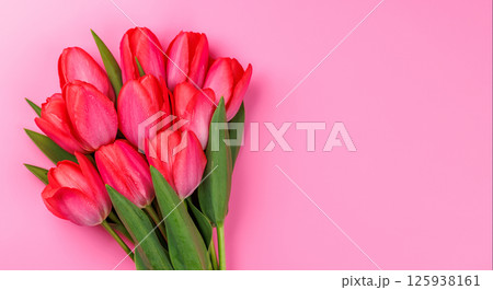 Pink tulip bouquet on a soft pink background 125938161