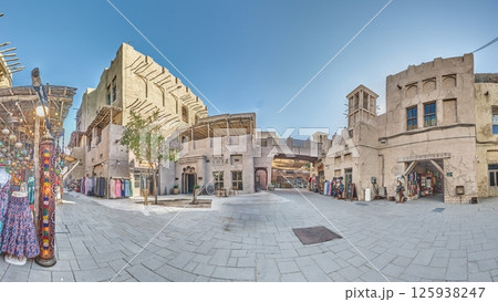 Historic architecture of Dubai old town with narrow alleys 125938247