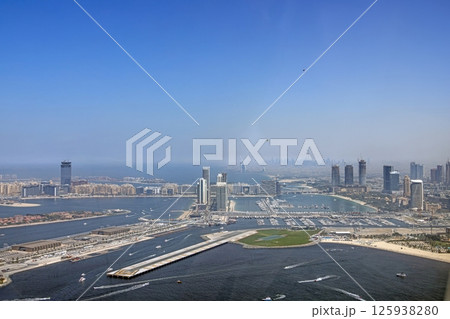 Aerial view of Dubai marina and coastline in daylight Aerial view of Dubai marina and coastline in daylight 125938280