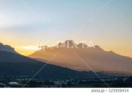 Simon's Mountain, South Africa, mountains silhouettes in sunset light, banner 125938414