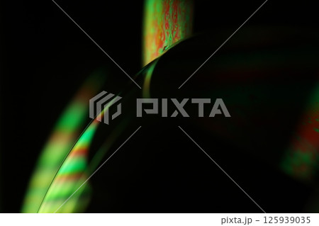 Green liquid surface on dark background, green Reflections of liquid in macro, green liquid surface, bubbles in macro, connection of bubbles in macro, cell from liquid, dark background, glossy surface Green liquid surface on dark background, green Reflections of liquid in macro, green liquid surface, bubbles in macro, connection of bubbles in macro, cell from liquid, dark background, glossy surface 125939035