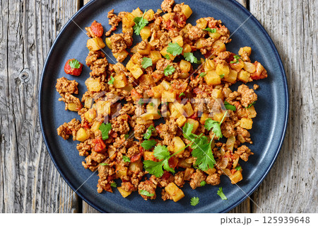 ground beef stew of potatoes and chopped tomatoes ground beef stew of potatoes and chopped tomatoes 125939648