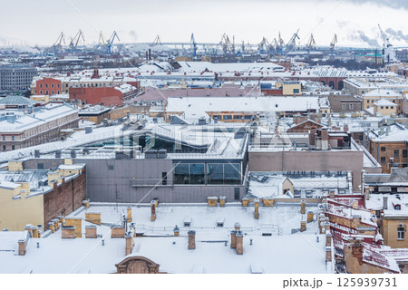 Old buildings roofs under the snow. Saint Petersburg. Russia. 125939731