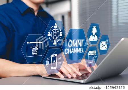 Omni Channel Digital Marketing and E-Commerce concept. Businessman with omni-channel market icon, customer engagement, online sales, print ads, website, social media, call center, email, store, mobile 125942366