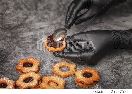 Linzer Christmas cookies. Process of making Linzer Christmas cookies. Process of making 125942520