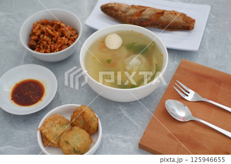 a traditional Indonesian meal served on a grey marble surface a traditional Indonesian meal served on a grey marble surface 125946655