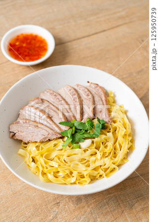dried duck noodles in white bowl dried duck noodles in white bowl 125950739