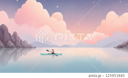 A man skillfully paddles his kayak across the serene surface of a lake 125951685