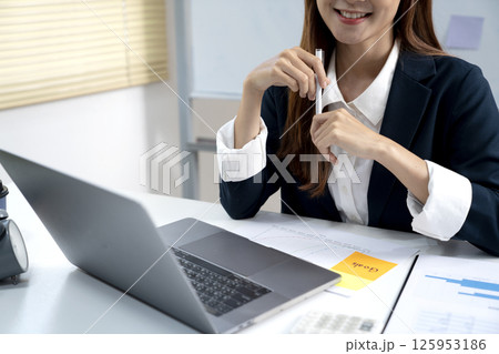 young businesswoman friendly smile at work young businesswoman friendly smile at work 125953186