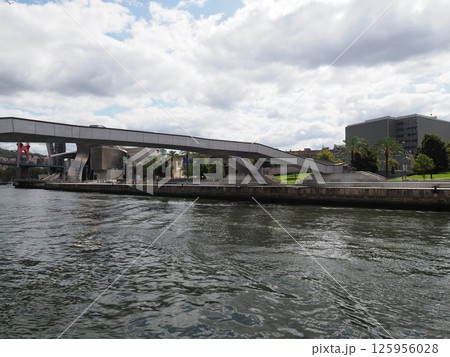 Scenic abandoibarra footbridge at Nervion river in European Bilbao city in Spain 125956028
