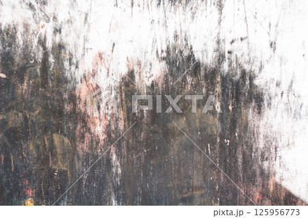 Old cracked paint. Grunge wall. The texture of the wall with deep cracks. Old cracked paint. Grunge wall. The texture of the wall with deep cracks. 125956773