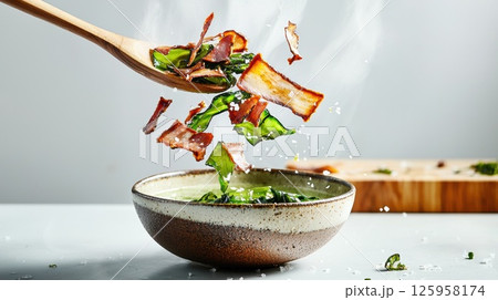 Crispy seaweed chips fall into a rustic bowl beside steaming miso soup in a cozy kitchen Crispy seaweed chips fall into a rustic bowl beside steaming miso soup in a cozy kitchen 125958174