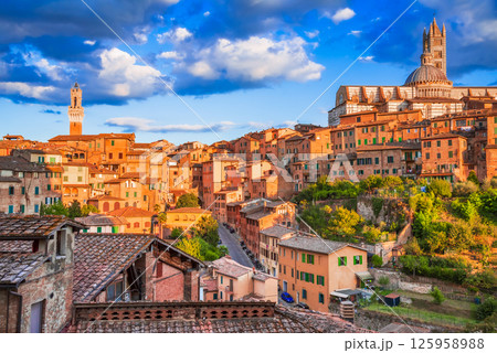 Siena, Italy. Vibrant sunset colors with historical city in Tuscany. 125958988