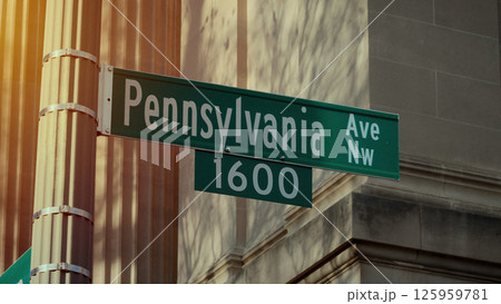 Pennsylvania Avenue street sign marking the address 1600 in Washington DC 125959781