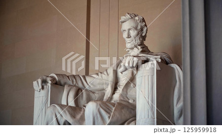 Majestic marble statue of Abraham Lincoln sitting in the Lincoln Memorial, Washington DC Majestic marble statue of Abraham Lincoln sitting in the Lincoln Memorial, Washington DC 125959918